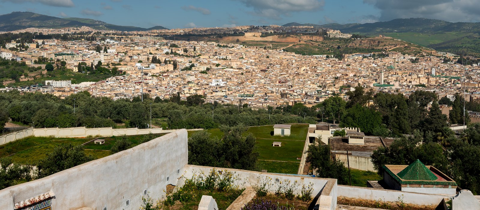 A wide panoramic view over the rooftops of the Fes el-Bali medina